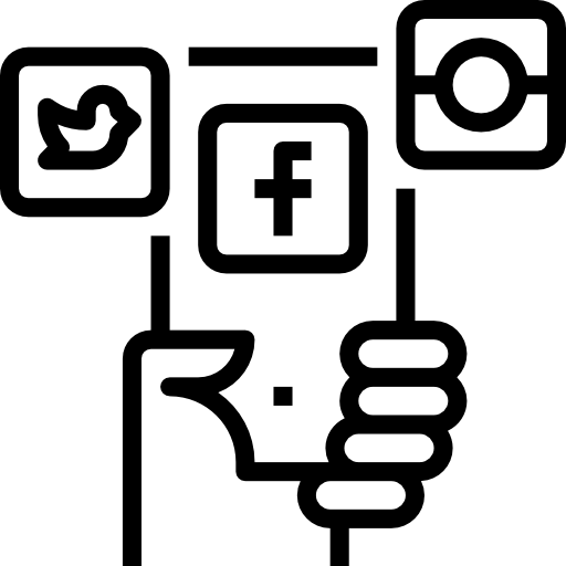 Hand holding mobile device with twitter, facebook and instagram logos.